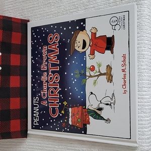 A Charlie Brown Christmas hardcover book.